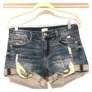 Distressed cuffed denim shorts